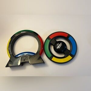 Lot of 2 Simon Handheld Memory Games Air Swipe Says Electronic Game